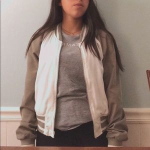 green and white bomber jacket